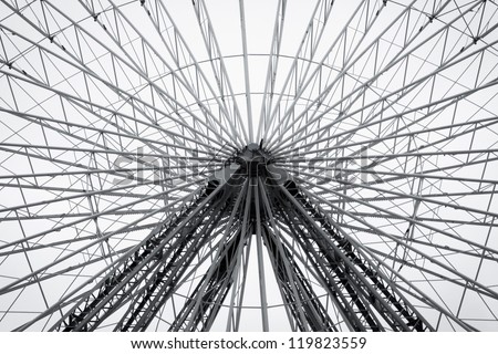 Ferris wheel in amusement park. Black and white fine art photo