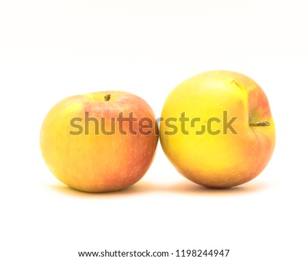 Studio shot close-up two Fuji apples isolated on white background. Fresh raw organic Colorado growth fruit, originated in Fujisaki, Japan.