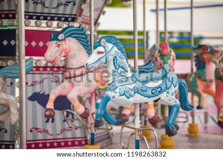 carousel horse Pastel color for kids During the weekend of family fun In the amusement park.