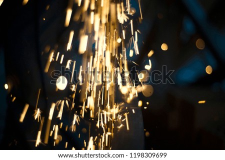 Magic glowing Flow of Sparks in the Dark. Sparks. Glitter vintage lights background. 