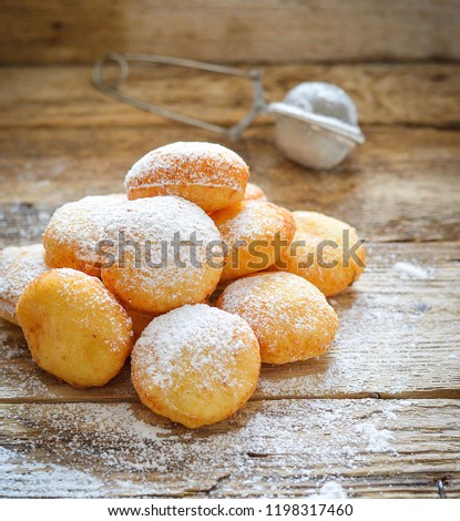 Donuts in powdered sugar