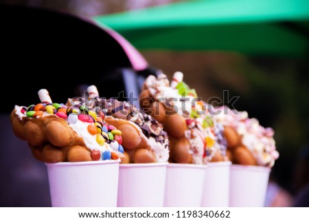 Different kinds Hong Kong wafers with ice cream with candied fruit and chocolate