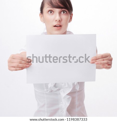 closeup. business woman showing poster with the word help. 