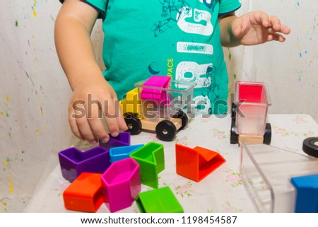 a small child plays an educational game