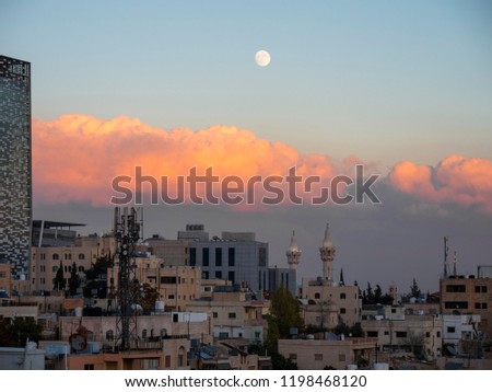Moon rising over the skyline of Amman, Jordan.