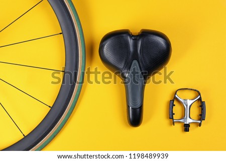Set of different bicycle parts on color background, flat lay Royalty-Free Stock Photo #1198489939