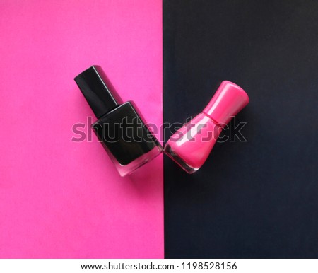black nail polish on  pink background and pink nail polish on  black background. Emotional style in manicure.