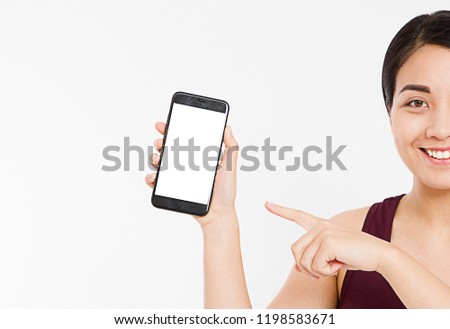 cropped portrait asian,korean woman,girl hold blank screen cellphone, finger pointing isolated on white background, hand holding black phone, copy space