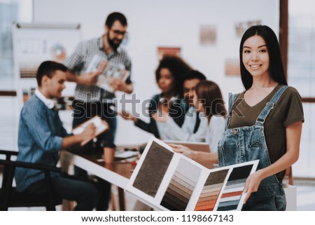 Samples of Color. Asian Girl. Office. Designers. Brainstorming. Design Studio. Multi-Ethnic. Project. Creative. Choose Colors for Design. Men. Workplace. Have Fun. Work Together. Create Ideas.