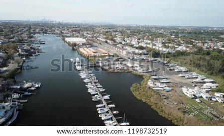 Aerial drone shutting photos from Mill Basin and Bergen Beach with balt parkway and yacht and pierses and school bases and houses in Brooklyn New York