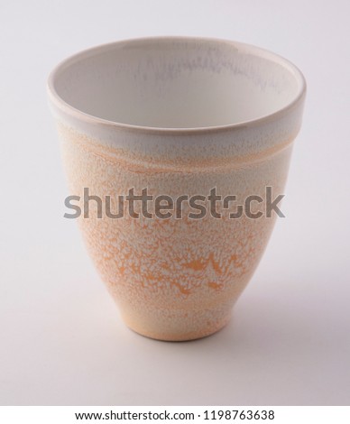 Beige cup still life photography