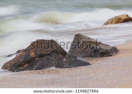 sea rock is breaking powerful wave