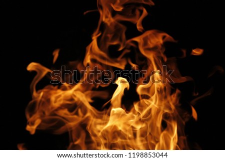Abstract fire flames isolated on black background.