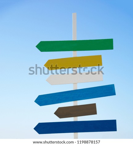 direction sign with blank spaces for text on beautiful sky background. Empty street sign