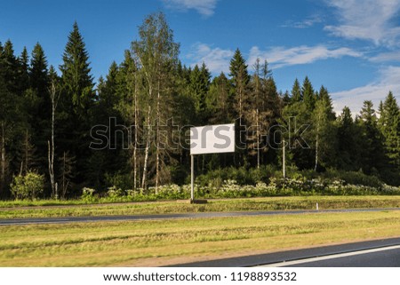 white billboard on the road