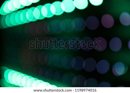Blurred bokeh background colorful abstract neon lights defocused night life