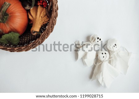 Ghosts decoration on white background. Halloween background.