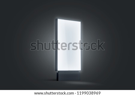 Blank white glowing pylon mockup, isolated in darkness, 3d rendering. Empty illumination street display mock up. Clear luminous outdoor lightbox template, side view. Advertising digital panel.