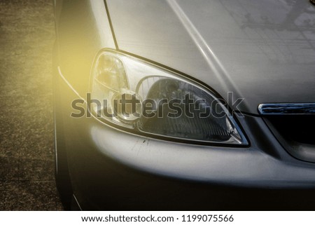 Car headlights, security technology symbol.