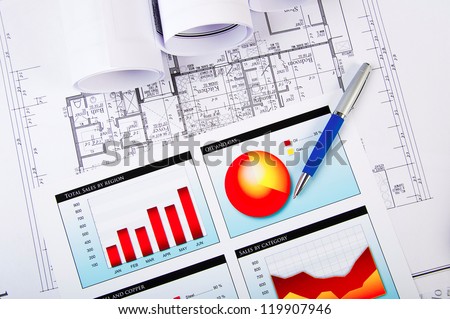 Drawings and charts of successful business, workplace of the businessman
