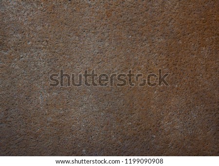 Brown cement plaster wall as background or texture