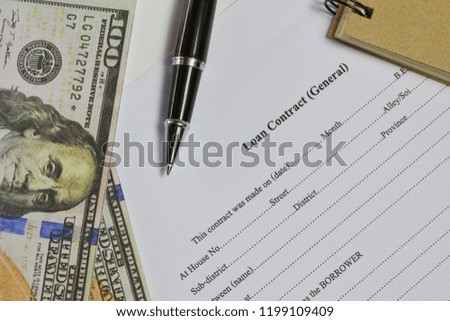 Flat lay photo with Loan contact Paper , Us dollar , notebook  and Pen on white background