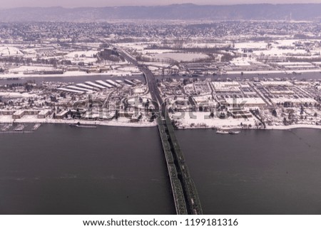 Aerial view on snow covered Portland metro area on a winter day in January 2017