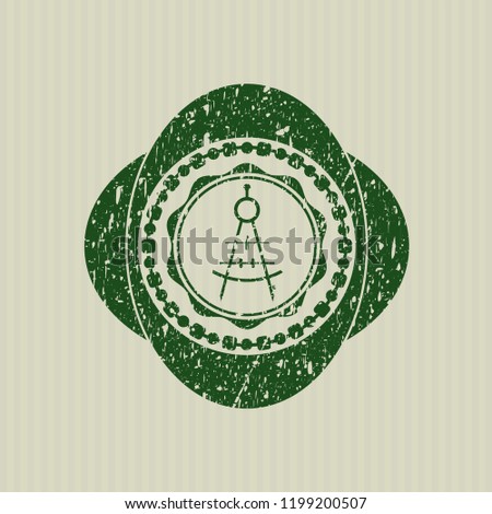 Green drawing compass icon inside distress grunge style stamp