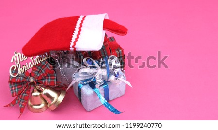 Gift Box and Christmas Decoration with Pink Backdrop.