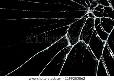 Broken glass on black background Royalty-Free Stock Photo #1199283862