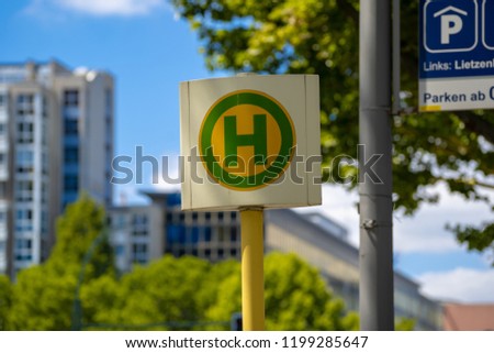 Photography of a Street Sign, Bus Stop Sign