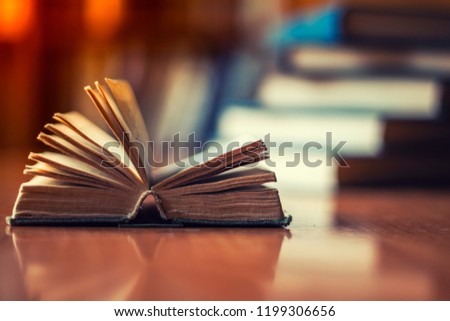 open book on the table Royalty-Free Stock Photo #1199306656