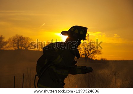 Firefighter at sunset