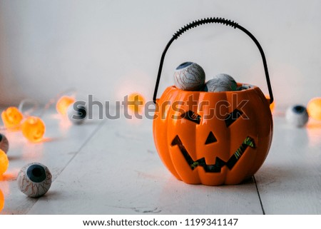 trick or treat. Halloween pumpkin with sweet chocolate eyes