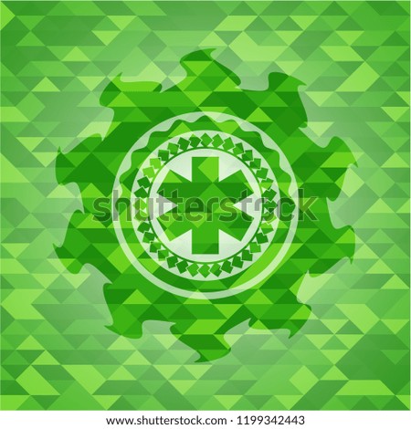 emergency cross icon inside green emblem with mosaic ecological style background
