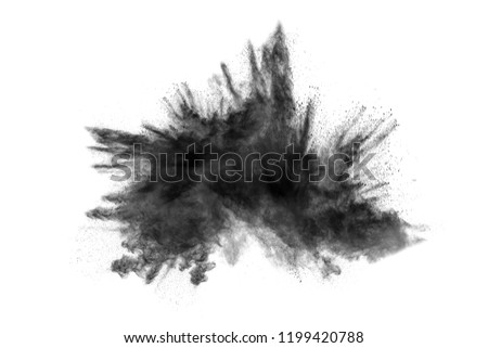 Black particles splattered on white background. Black powder dust splashing.
