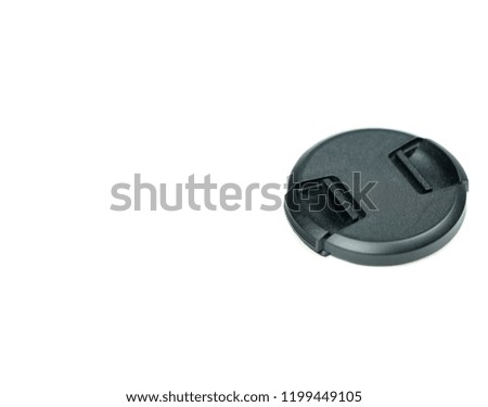 Black cover for protect lens of camera with copy space on isolated white