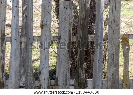 old wooden fence in the countryside.