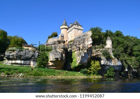 castle of Belcayre, canoe on the river Vezere, France