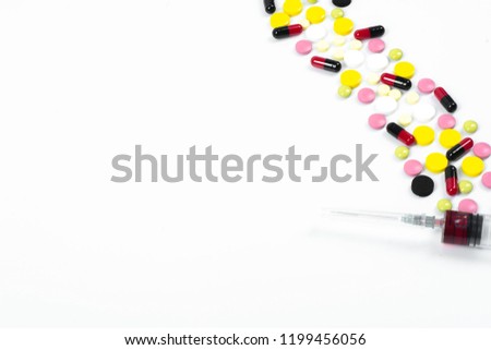 Many colorful pills and tablets isolated on white. vitamin pills. Collection of medicine pills on table. Lots of different medicine drugs, pills, tablets, capsules. Concept of health. 