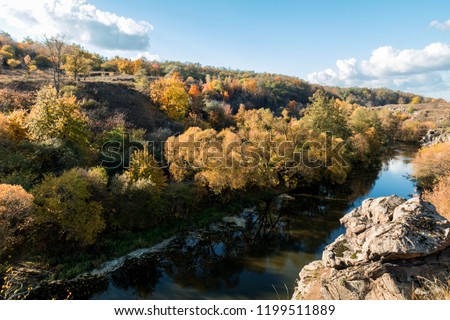 Terrific view of the River Canyon on a sunny fall dayTerrific view of the River Canyon on a cloudy fall day. Buky Canyon on the Hirs'kyi Tikych river in Ukraine.