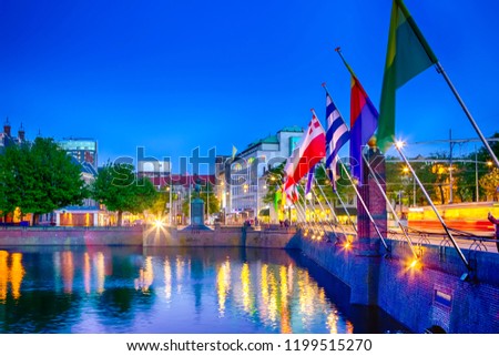 Lines of Flags on The Bridge In Front of the Palace in The Netherlands.  Horizontal image