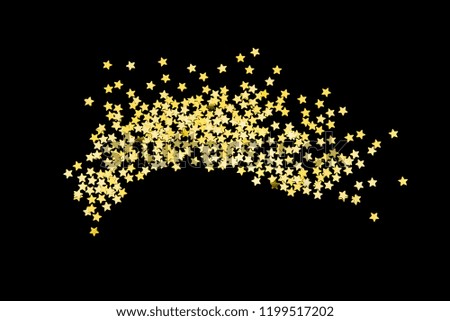 Group of gold star glitter isolated on black background  decoration christmas happy new year object design on top view