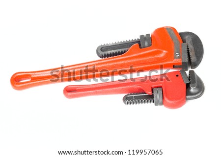 Pair of big and small red monkey wrenches isolated on white background