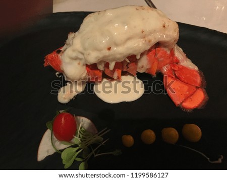 Lobster dinner, lobster plate fine dining with sauce stock photo image
