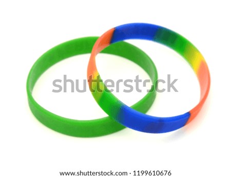 Two rubber bands on white