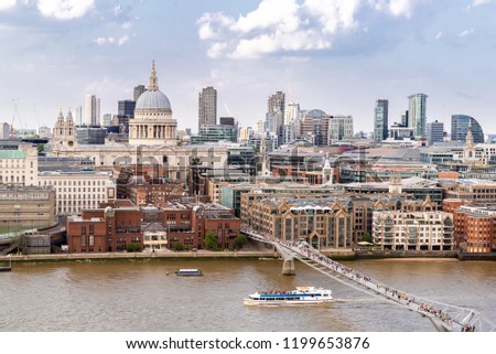 Aerial view of London St Paul's Cathedral with London Millennium Bridge in London England UK