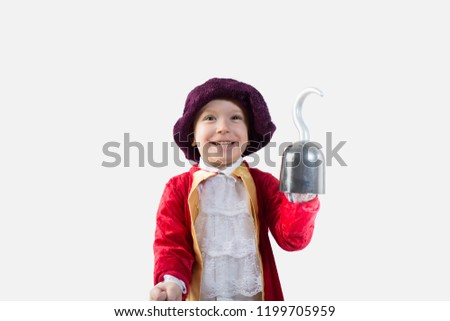 Happy boy dressed in a pirate Halloween Costume