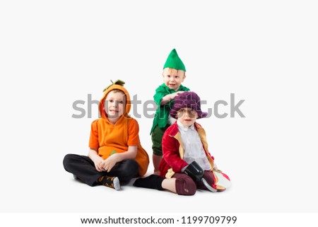 Cute kids in Halloween Costumes