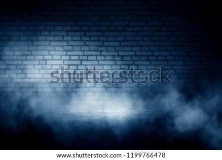 Background of empty dark room with concrete floor. Empty brick walls, neon light, smoke.
